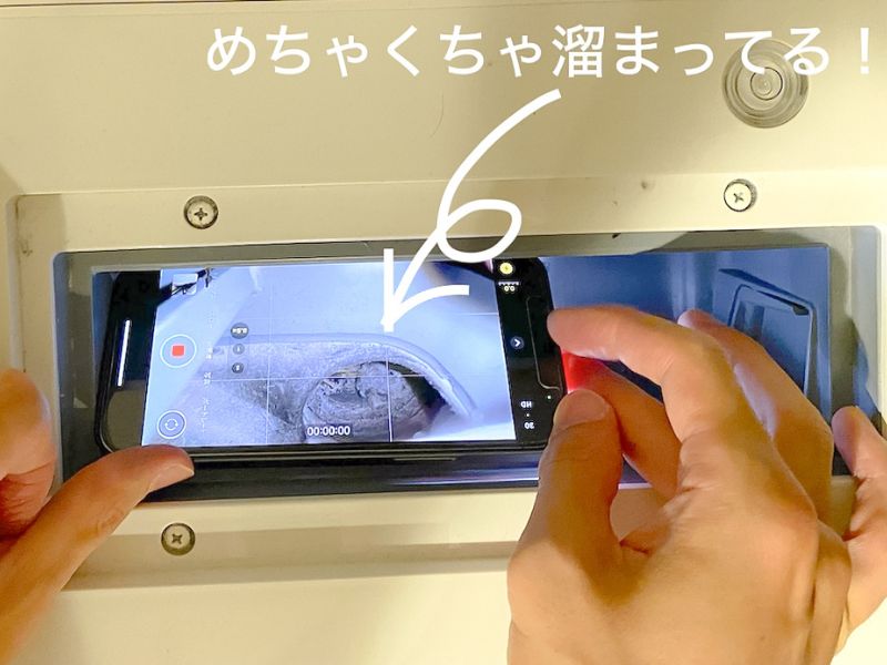 ドラム式洗濯機のホコリ取り、排気口の覗き方